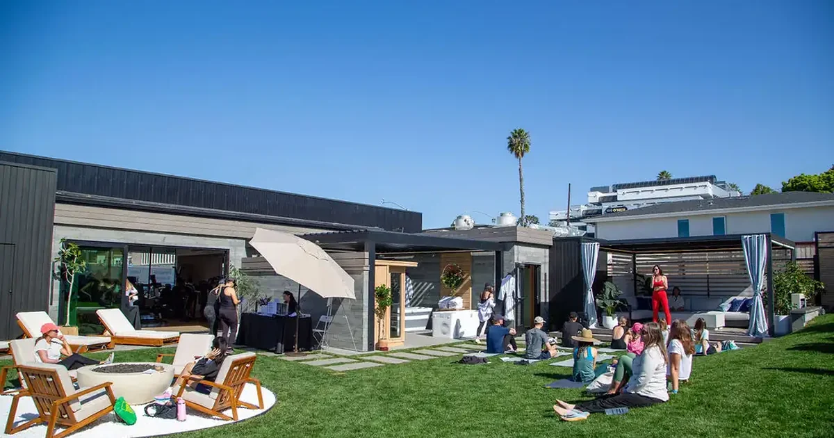 Members at a community event on the lawn at Bluprint Wellness in Solana Beach