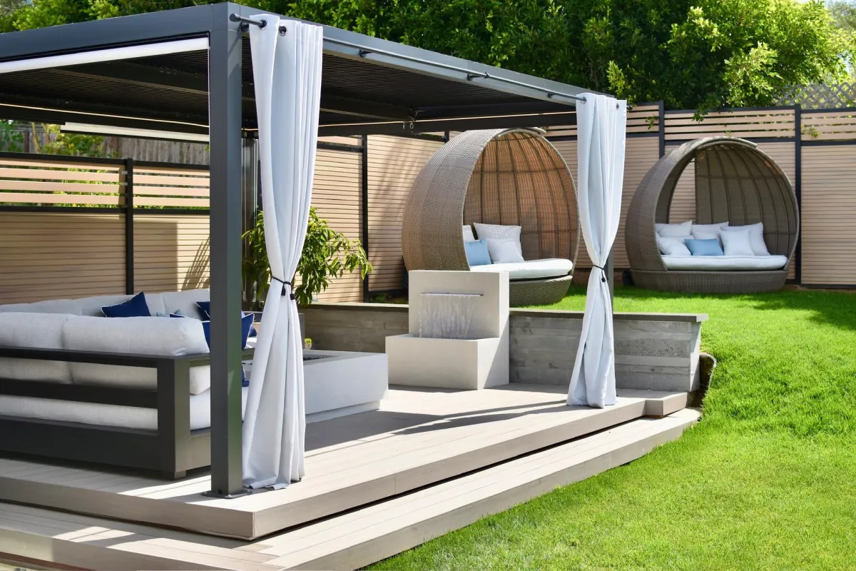 The outdoor community space with cabana seating